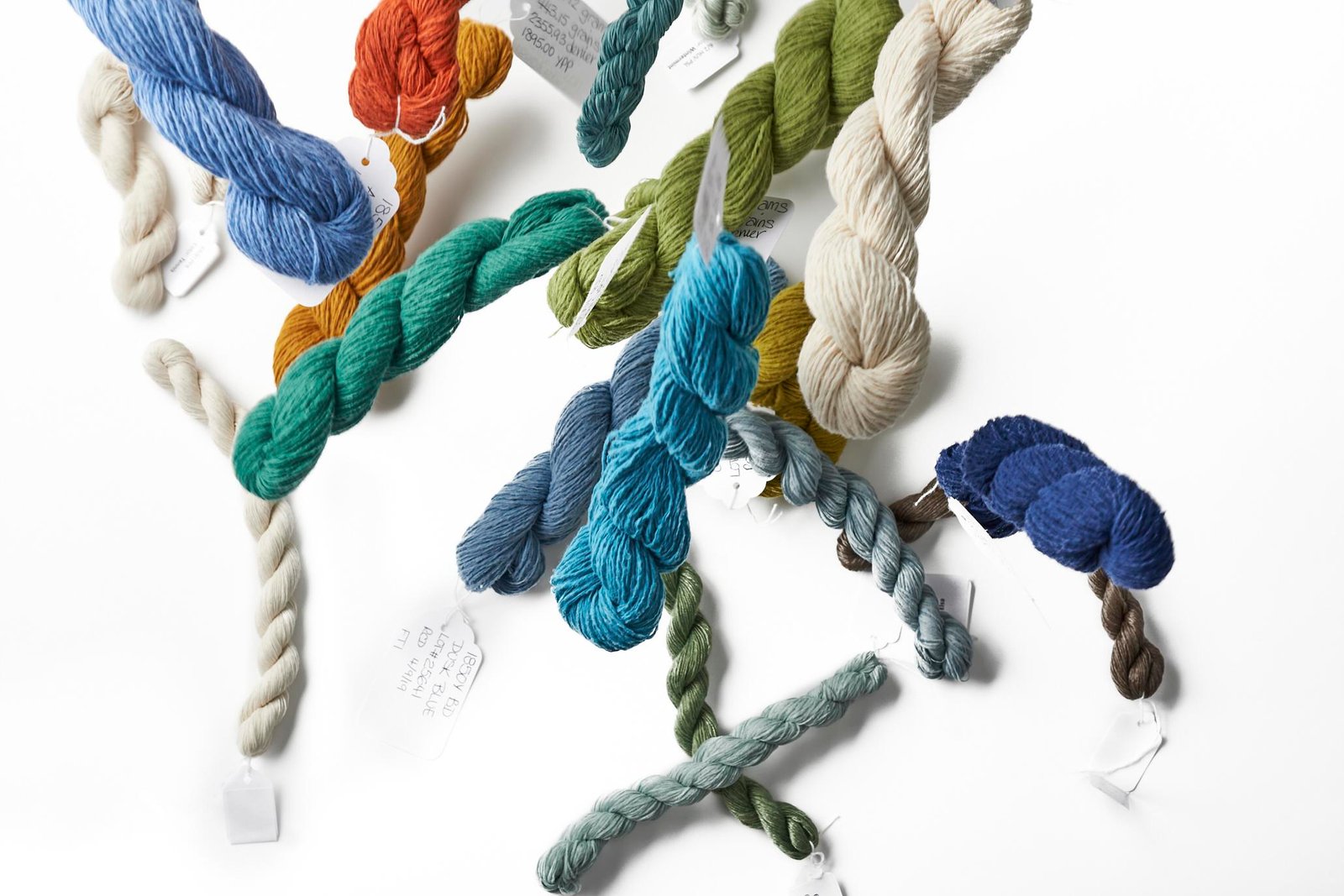 Product lifestyle photography of multi colored fabric on white surface