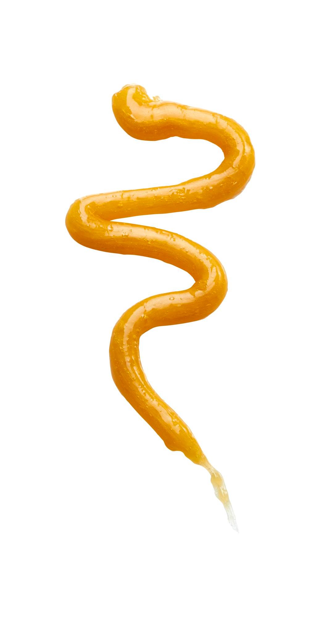 medical product photography of gold color opaque silicon gel material medical device product on white background in a zigzag form