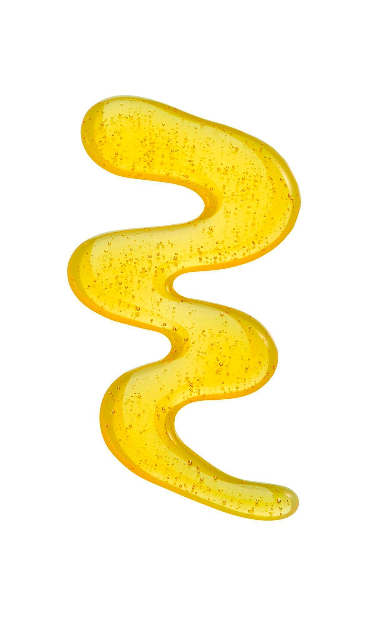 medical product photography of gold color transparent silicon gel material medical device product on white background in a zigzag form