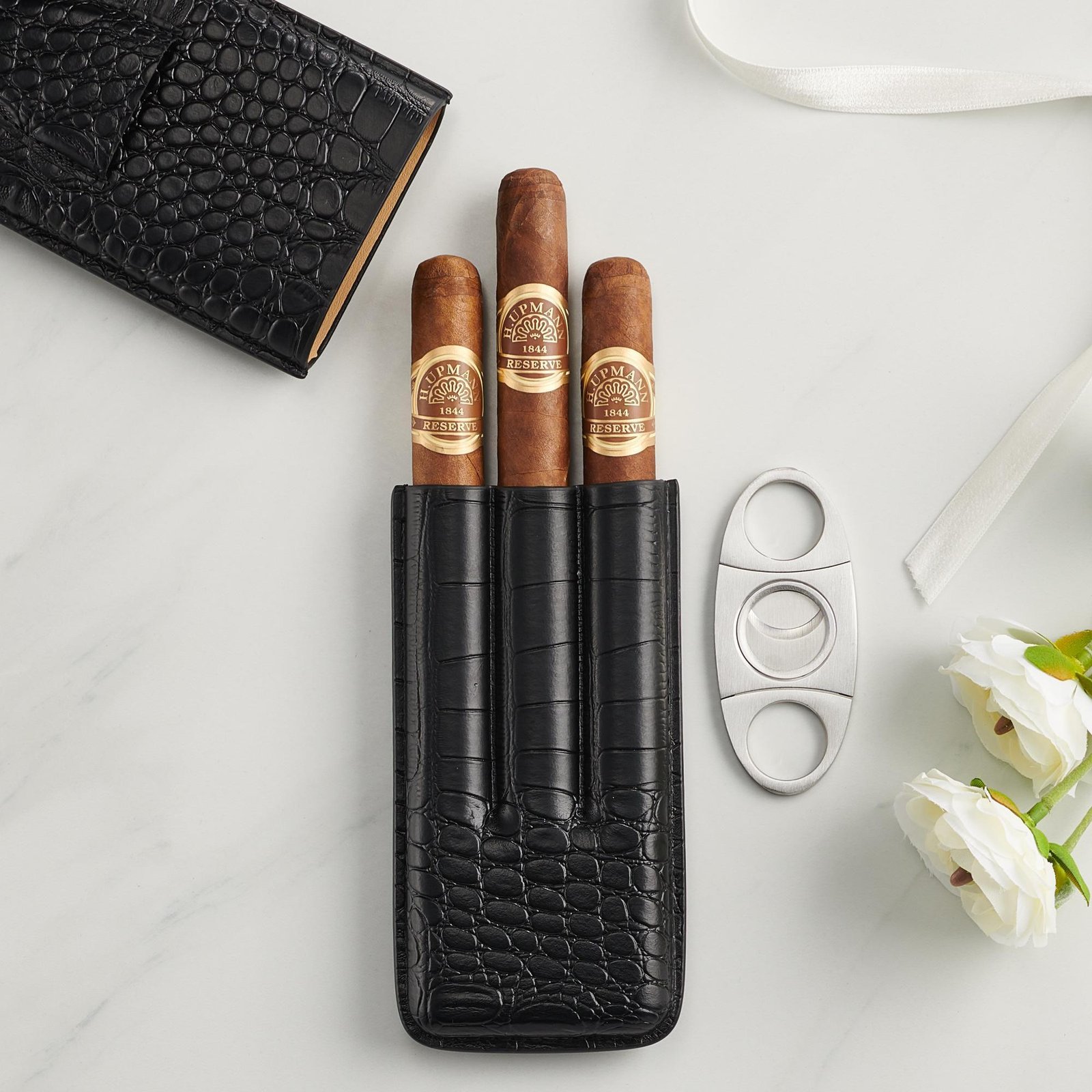 Product lifestyle photography of cigar gift case on marble surface