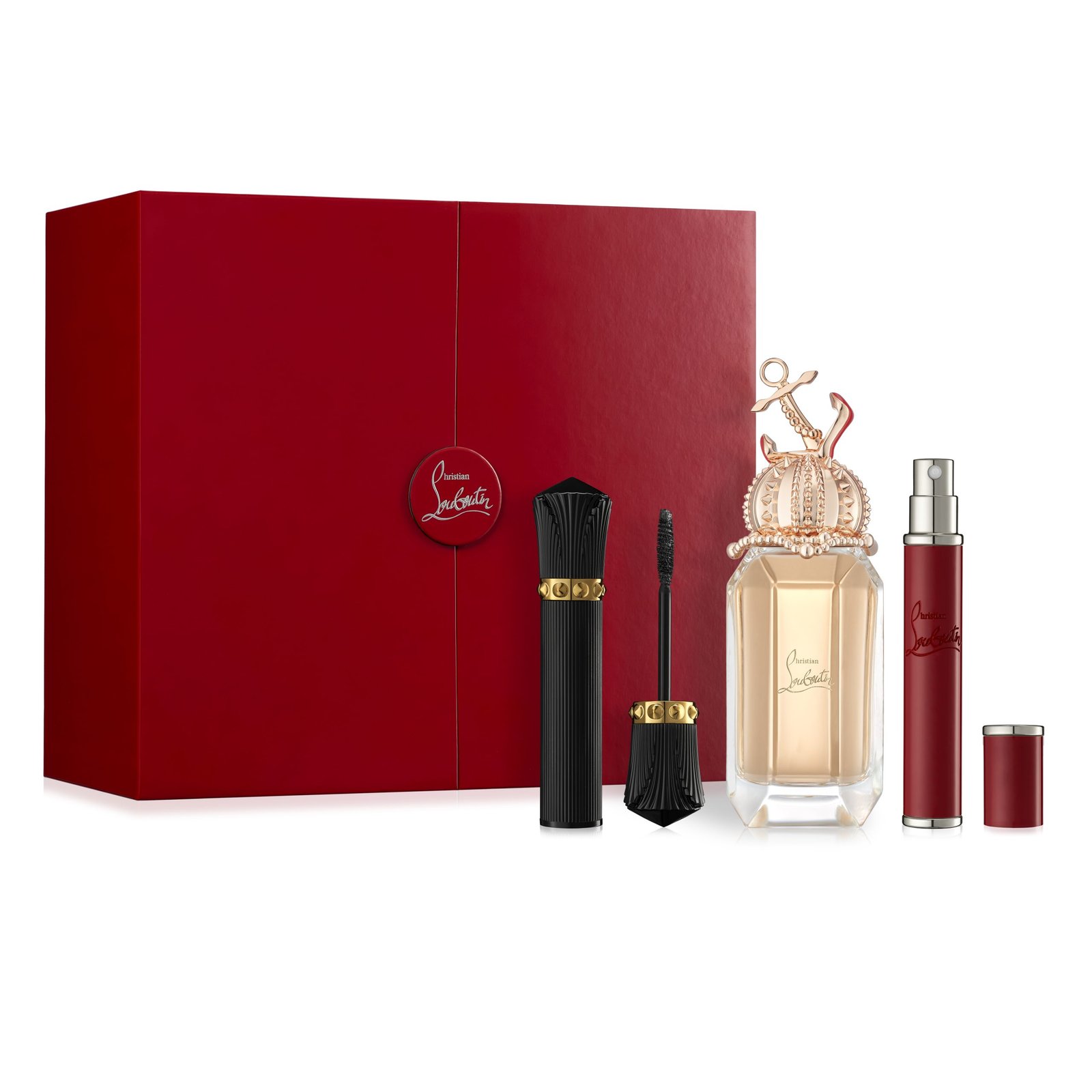 product photography on white surface of lipstick cosmetics perfume bottle and box