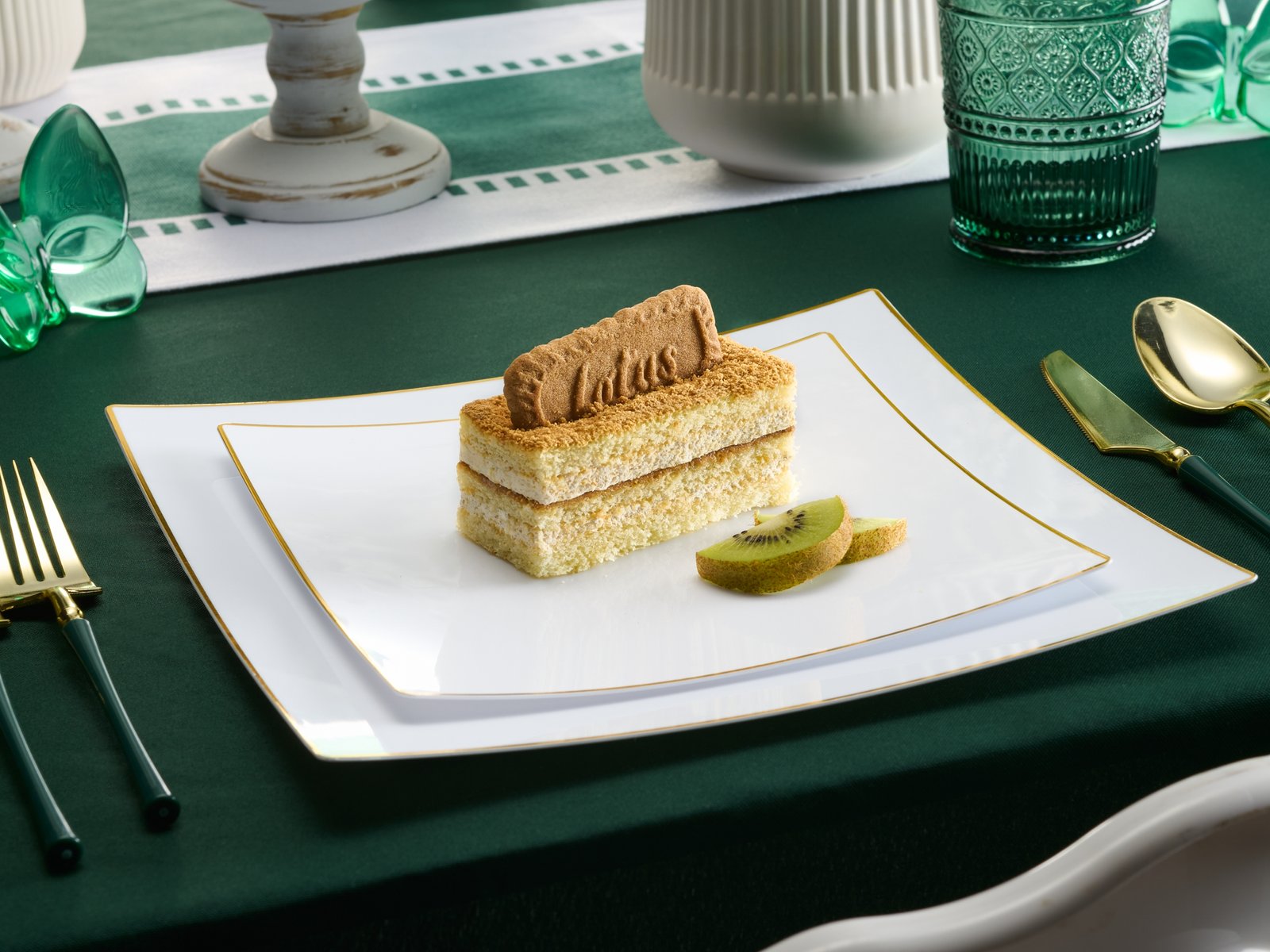 product lifestyle photography of white dinner plate setting with vanilla cake and cookie on top on dinner plates