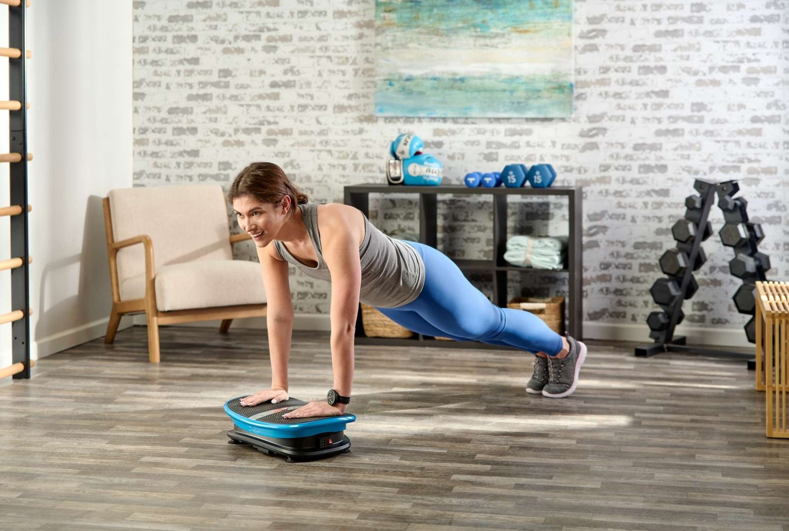 product lifestyle photography of female model in living room set doing pushups on floor with exercise machine product